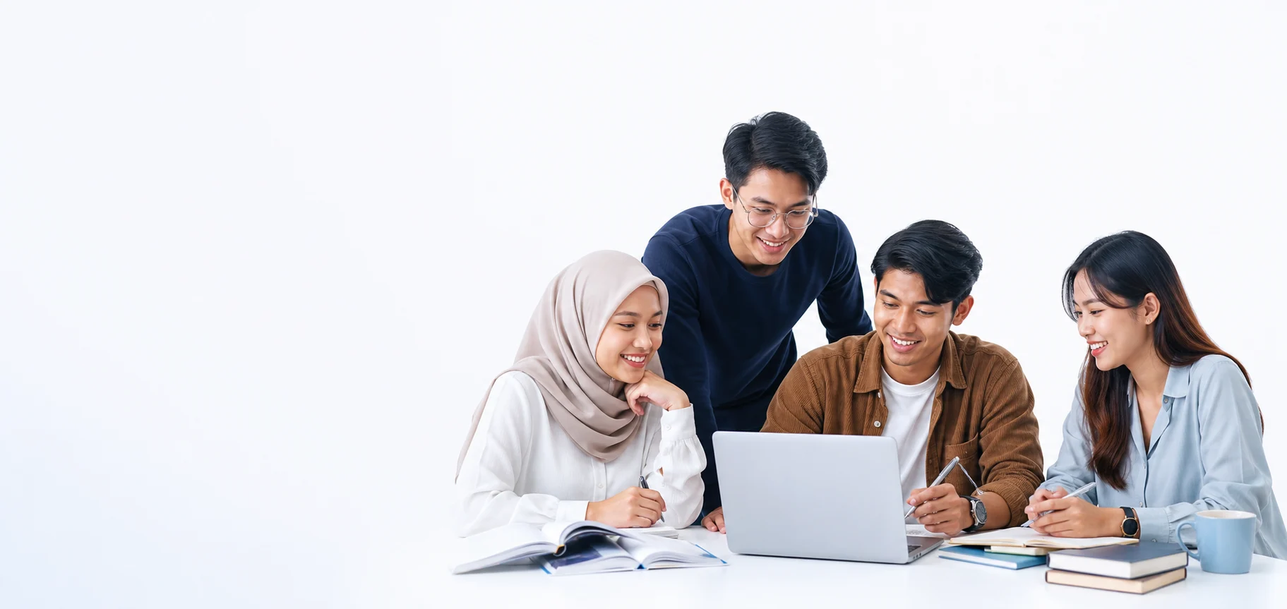 A diverse group of students collaborating around a laptop
